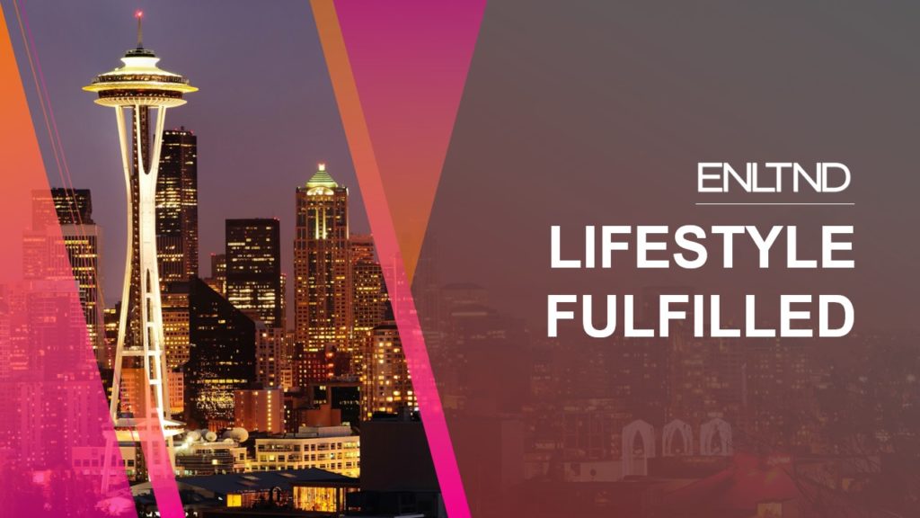 A pitch deck slide with an evening cityscape featuring Seattle's Space Needle, surrounded by illuminated buildings against a purple sky. To the right, text reads "ENLTD: Lifestyle Fulfilled" with a modern, gradient overlay.